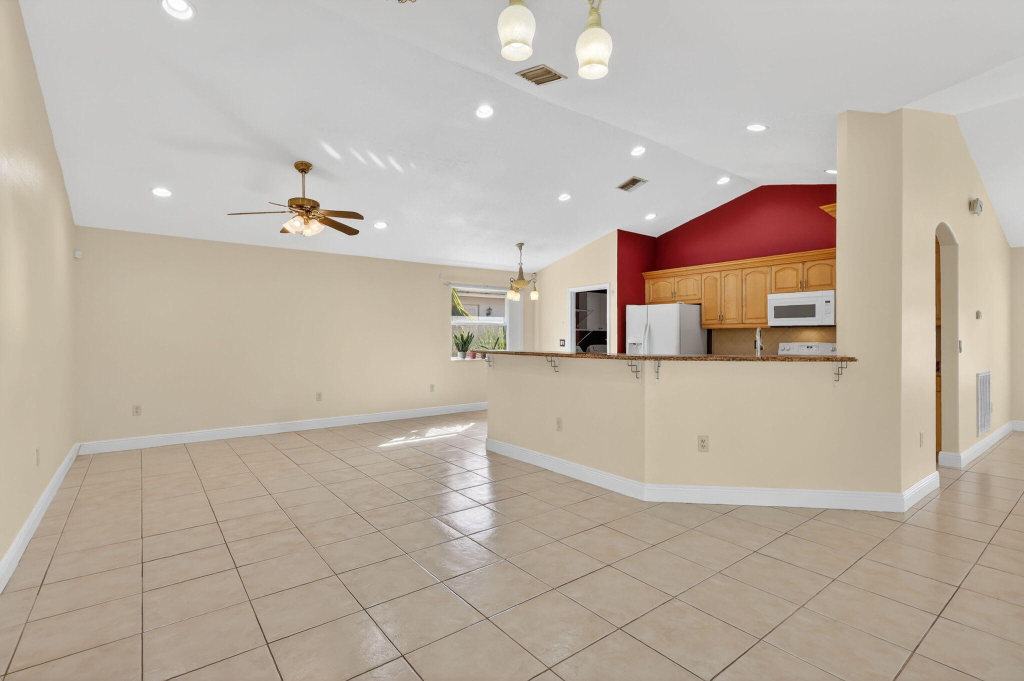 3282 Southeast W Snow Road Port St. Lucie, FL 34984 - Photo 16 of 52 Family Room/Kitchen