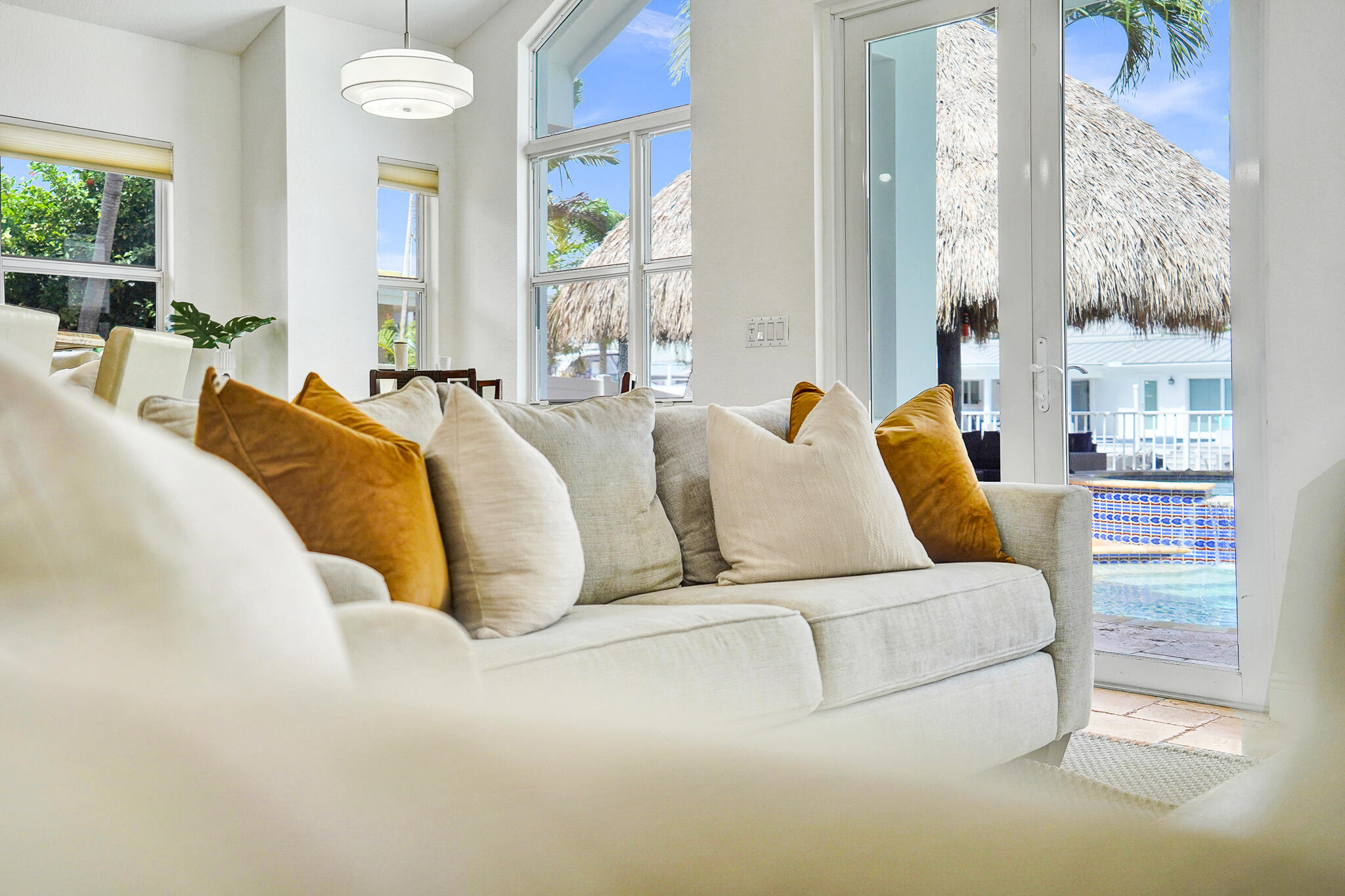 785 Northeast 71st Street Boca Raton, FL 33487 - Photo 12 of 62 a living room with furniture and a large window