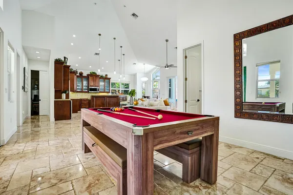 a spacious bathroom with a granite countertop sink mirror and a