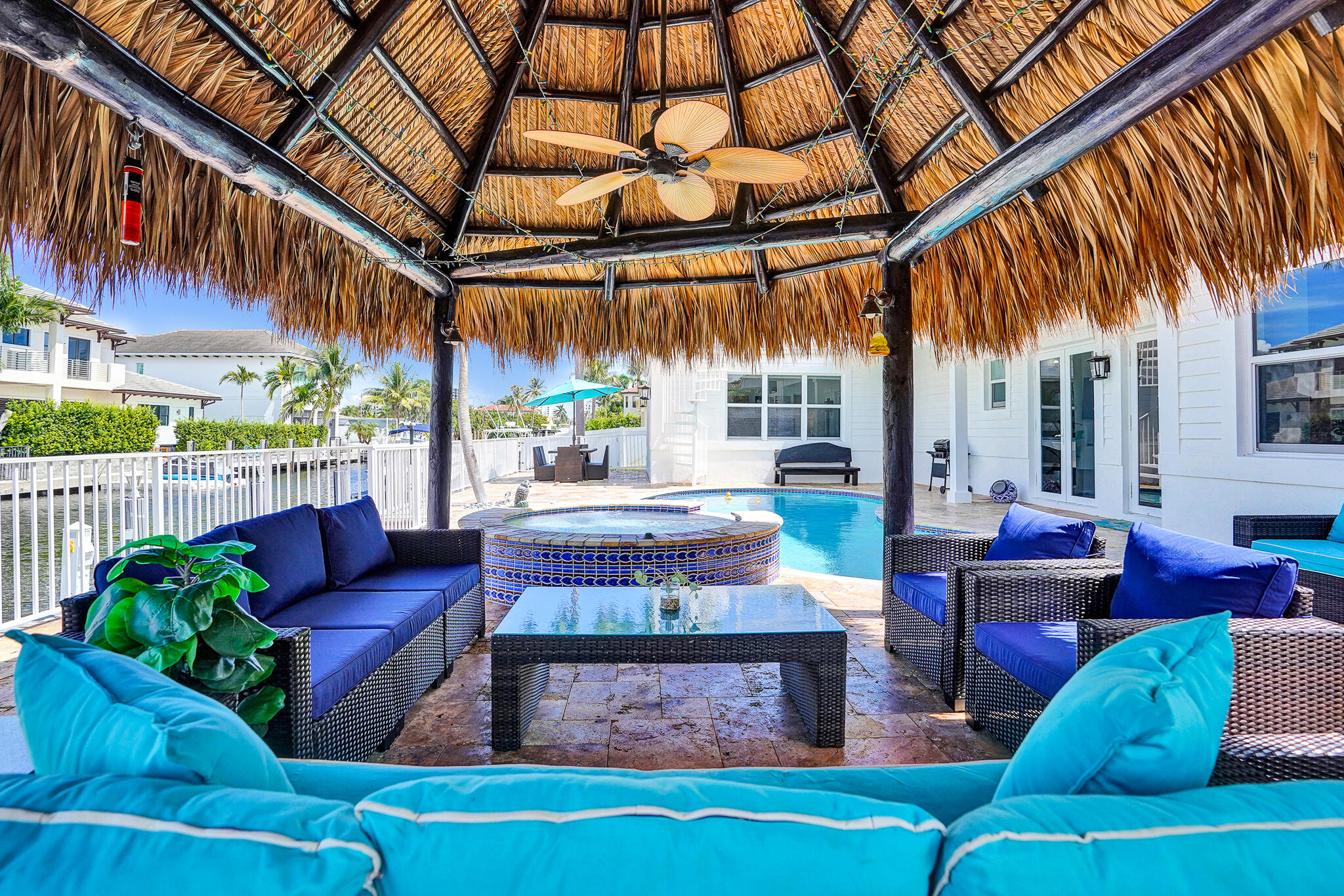 785 Northeast 71st Street Boca Raton, FL 33487 - Photo 39 of 62 a outdoor living space with furniture and a fireplace