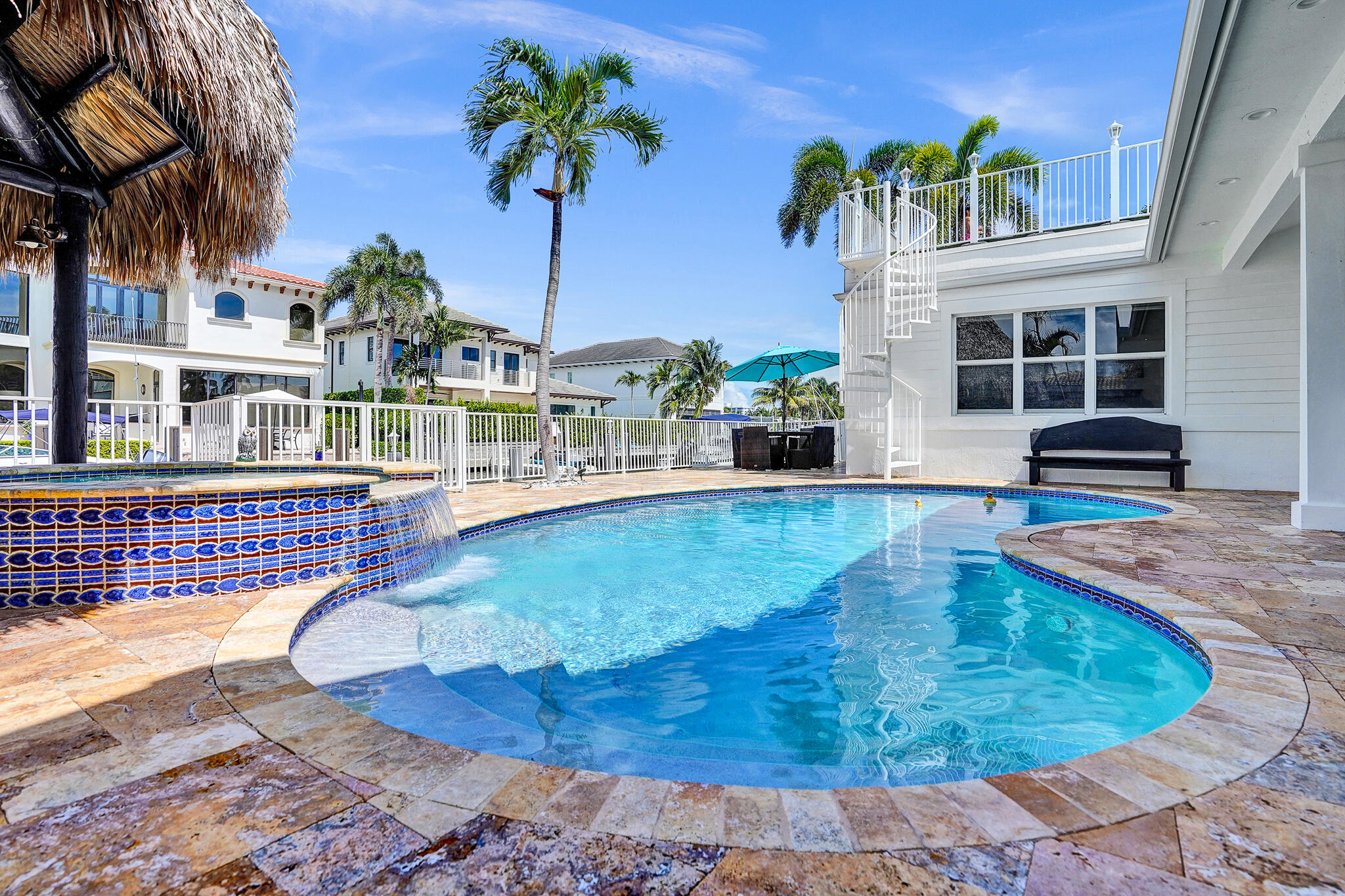 785 Northeast 71st Street Boca Raton, FL 33487 - Photo 4 of 62 a view of a swimming pool with a patio