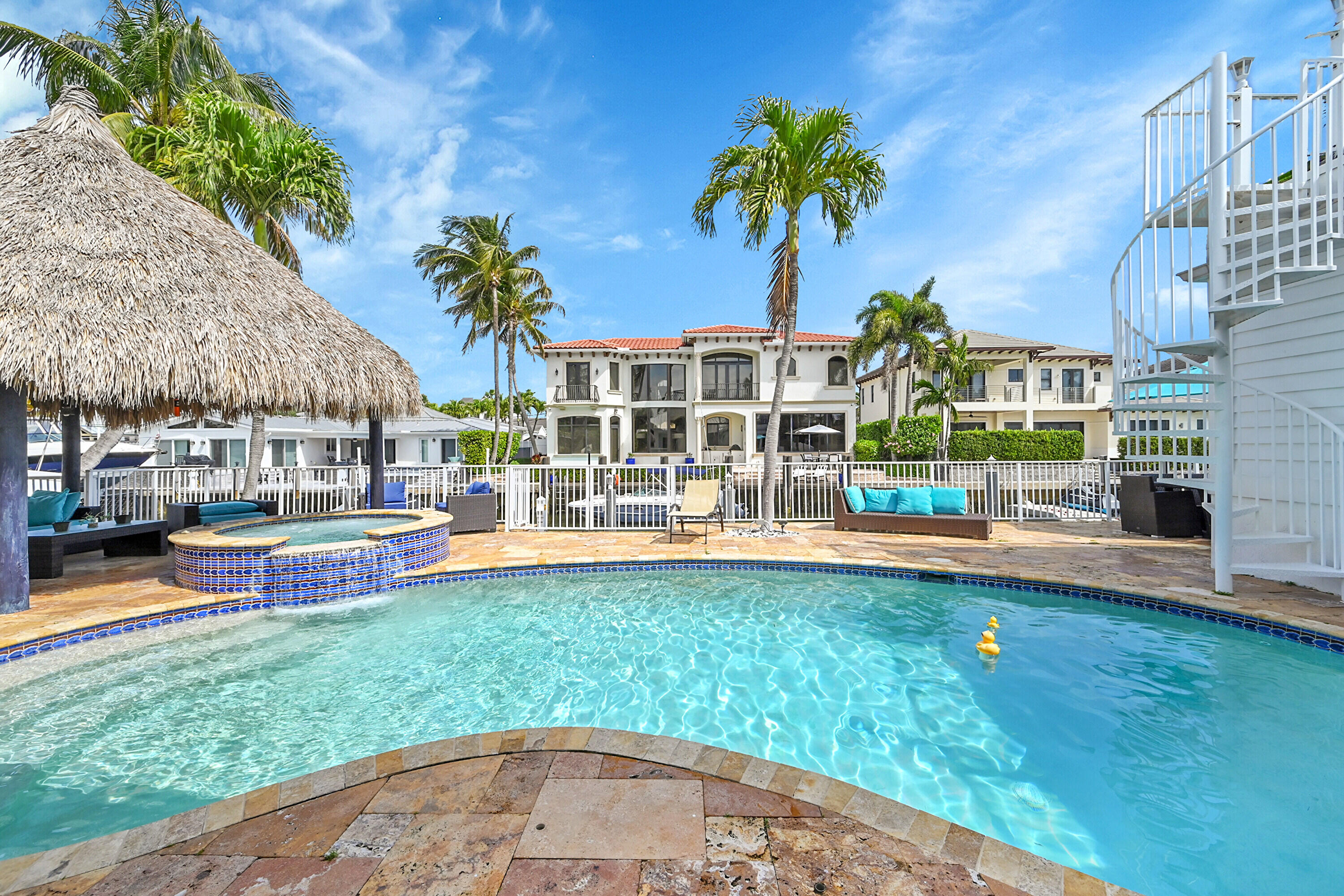 785 Northeast 71st Street Boca Raton, FL 33487 - Photo 43 of 62 a view of a house with a swimming pool