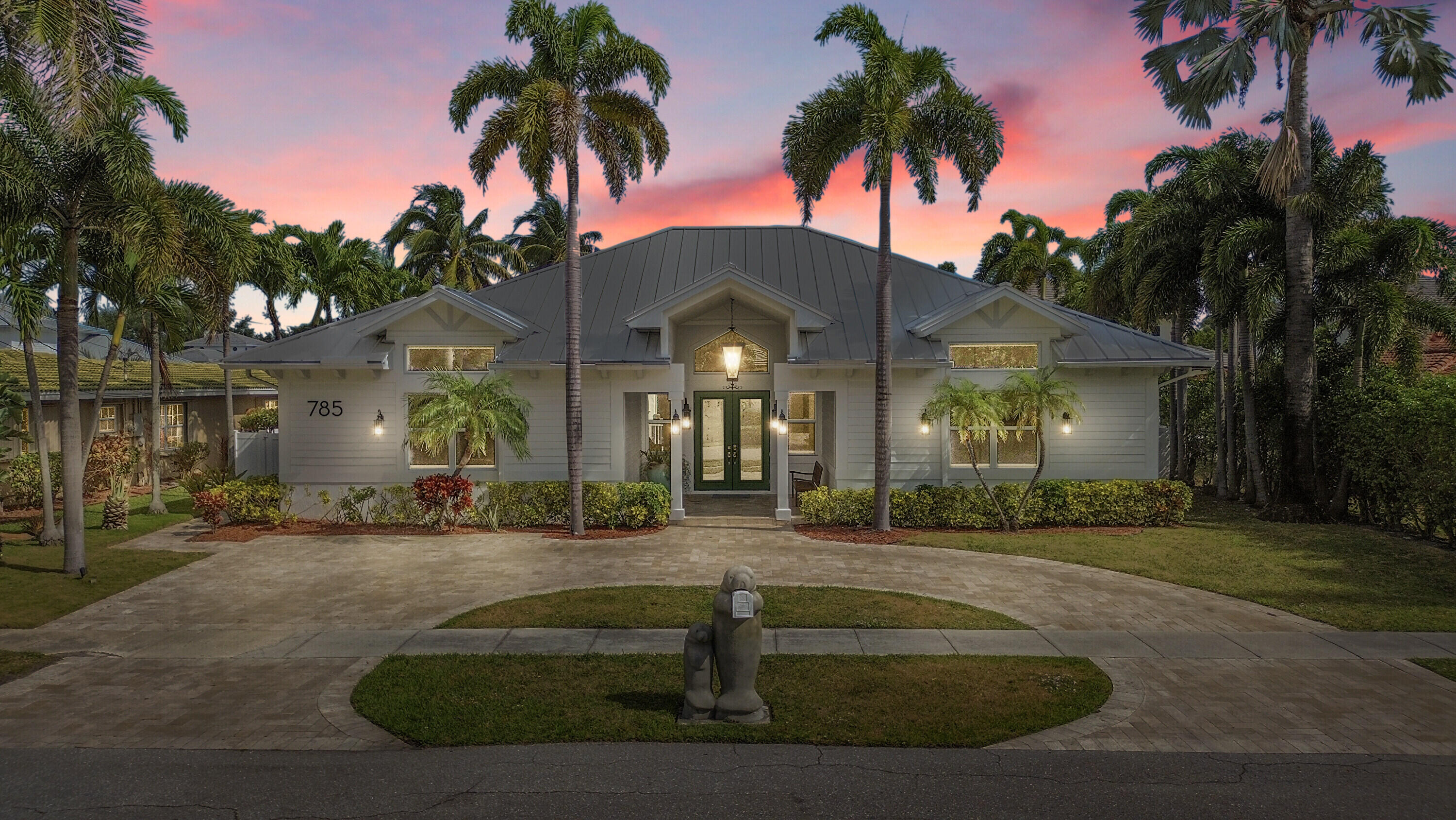 785 Northeast 71st Street Boca Raton, FL 33487 - Photo 62 of 62 a view of a house with palm trees