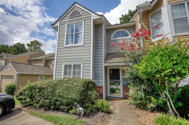 front view of a house with an outdoor space