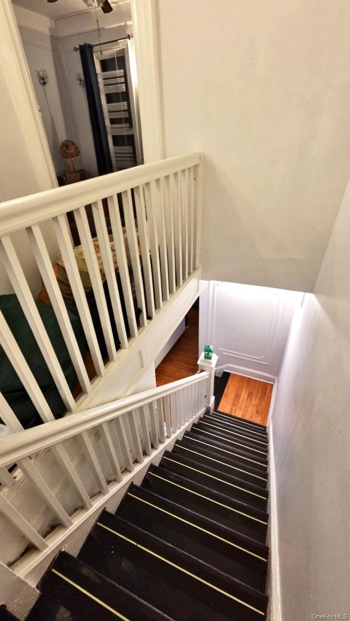 25-55 97th Street Queens, NY 11369 - Photo 7 of 15 a view of stairs and furniture