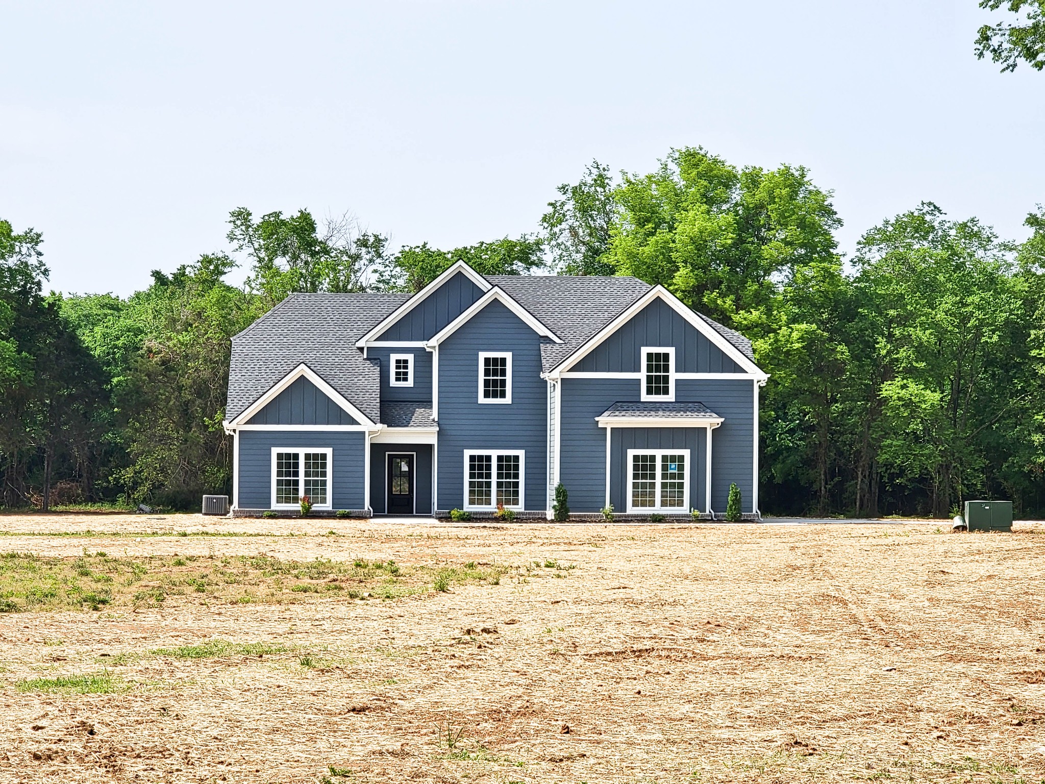 1581 Harrison Road Murfreesboro, TN 37128 - Photo 1 of 25 a front view of a house with a yard