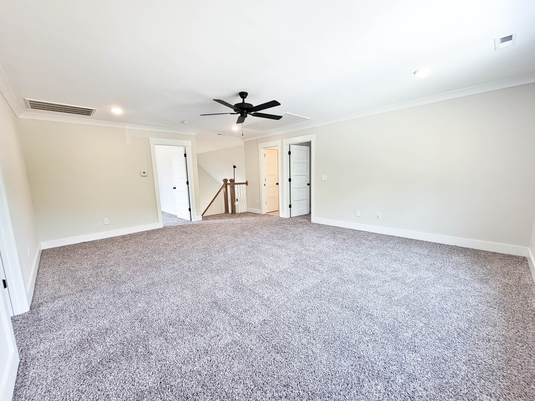 1581 Harrison Road Murfreesboro, TN 37128 - Photo 18 of 25 a view of an empty room with a ceiling fan