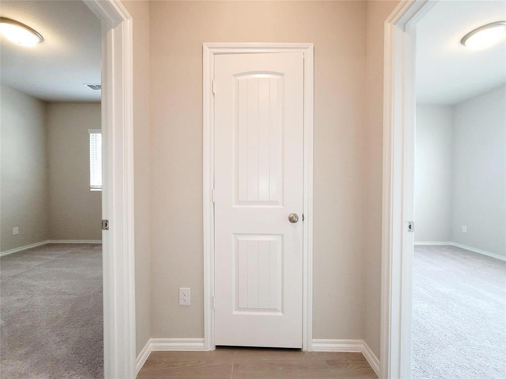 933 Ravenwood Lane Van Alstyne, TX 75495 - Photo 8 of 10 a view of an empty room