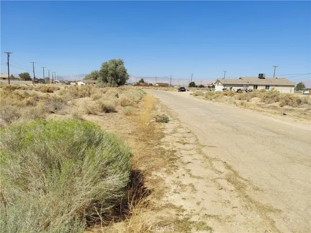 a view of ocean view with wooden fence