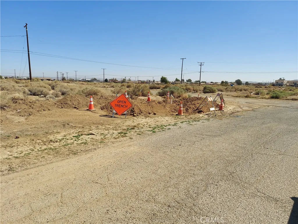 0 Walpole Avenue, Unit 1 Edwards, CA 93523 - Photo 4 of 4 a view of a dry yard with a large tree
