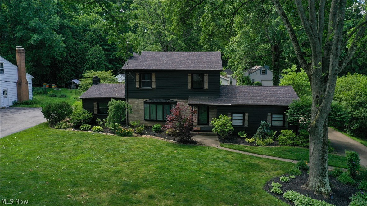 2411 Ridgeview Lane Youngstown, OH 44514 - Photo 47 of 48 Two-story exterior featuring dark siding, stone accents, and a bay window
