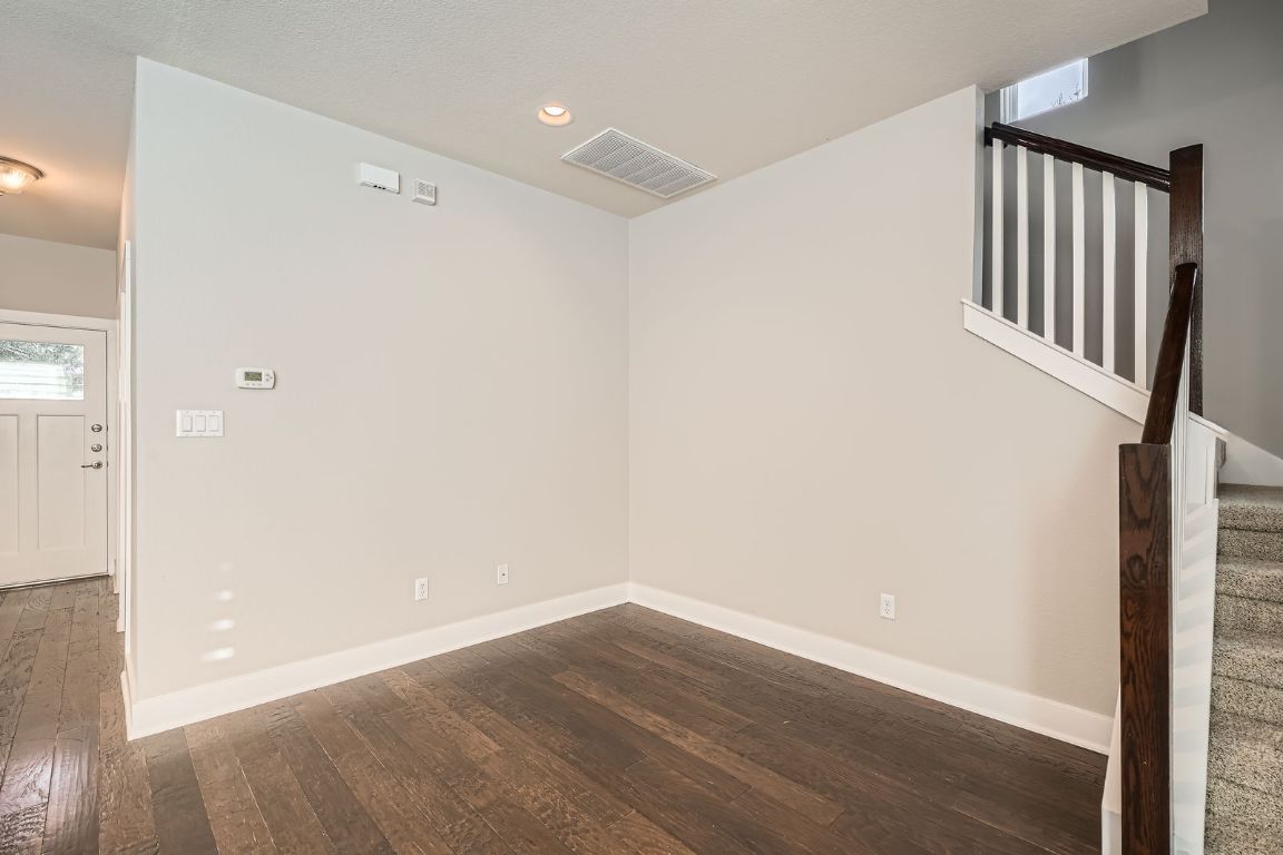 12200 Barras Branch Drive, Unit 135 Austin, TX 78748 - Photo 12 of 31 wooden floor in an empty room