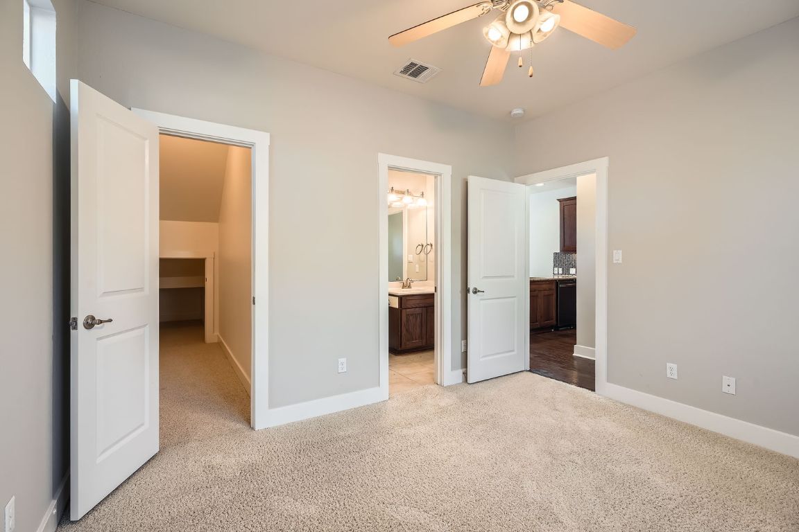 12200 Barras Branch Drive, Unit 135 Austin, TX 78748 - Photo 13 of 31 en view interior of the house and hallway