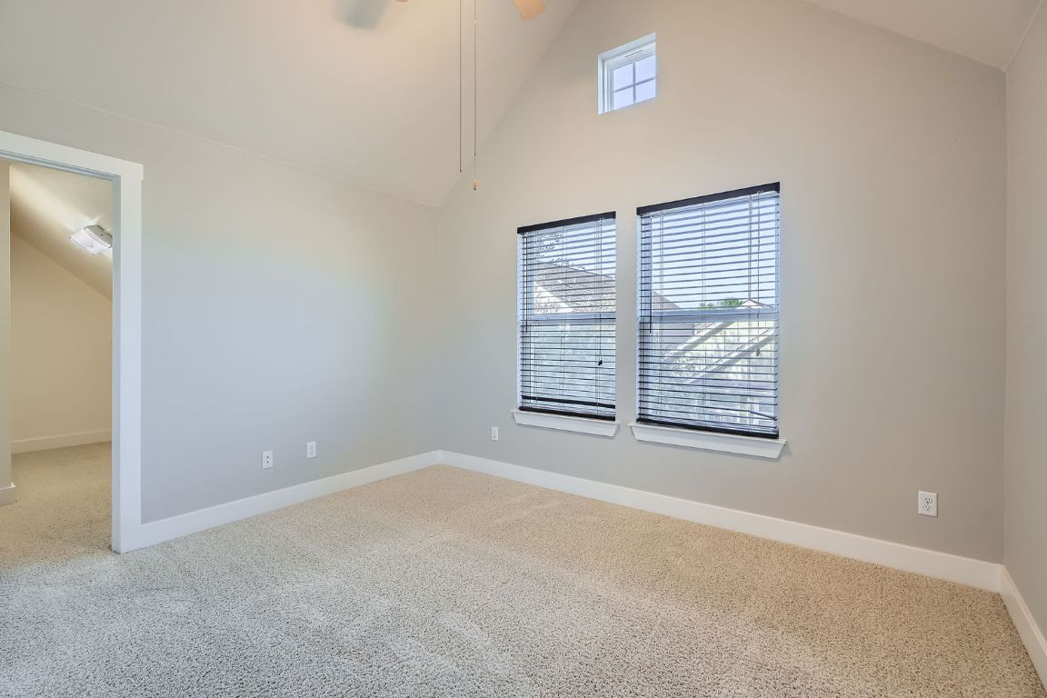 12200 Barras Branch Drive, Unit 135 Austin, TX 78748 - Photo 22 of 31 an empty room with windows
