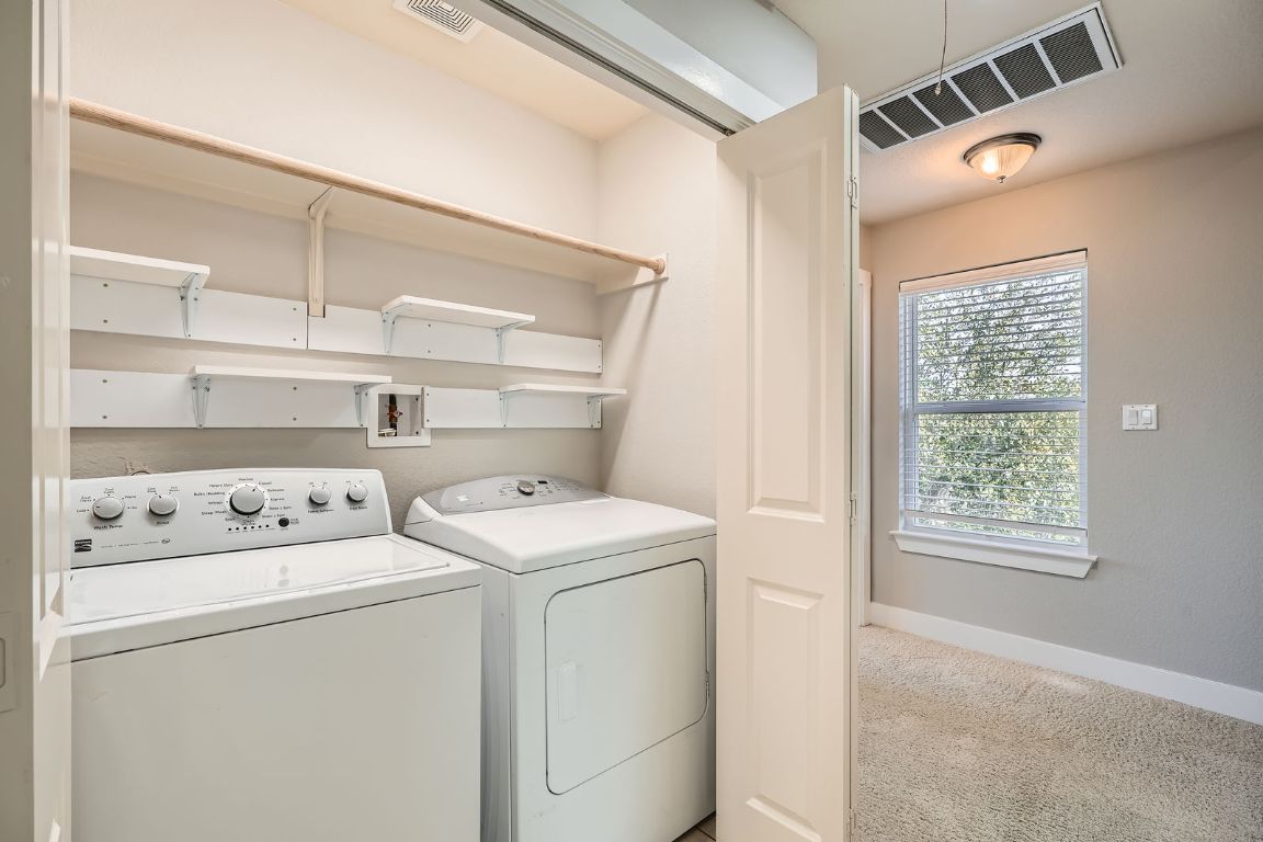 12200 Barras Branch Drive, Unit 135 Austin, TX 78748 - Photo 26 of 31 a utility room with dryer and washer
