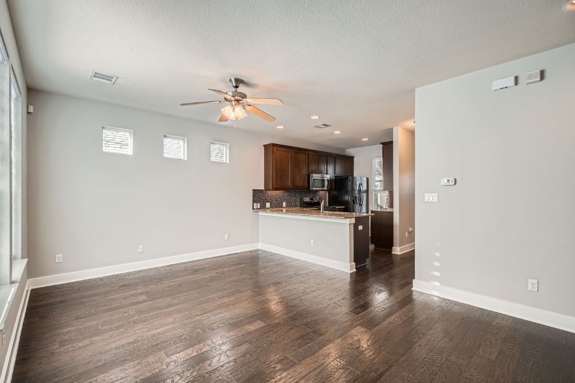 12200 Barras Branch Drive, Unit 135 Austin, TX 78748 - Photo 6 of 31 a view of kitchen with stove and refrigerator
