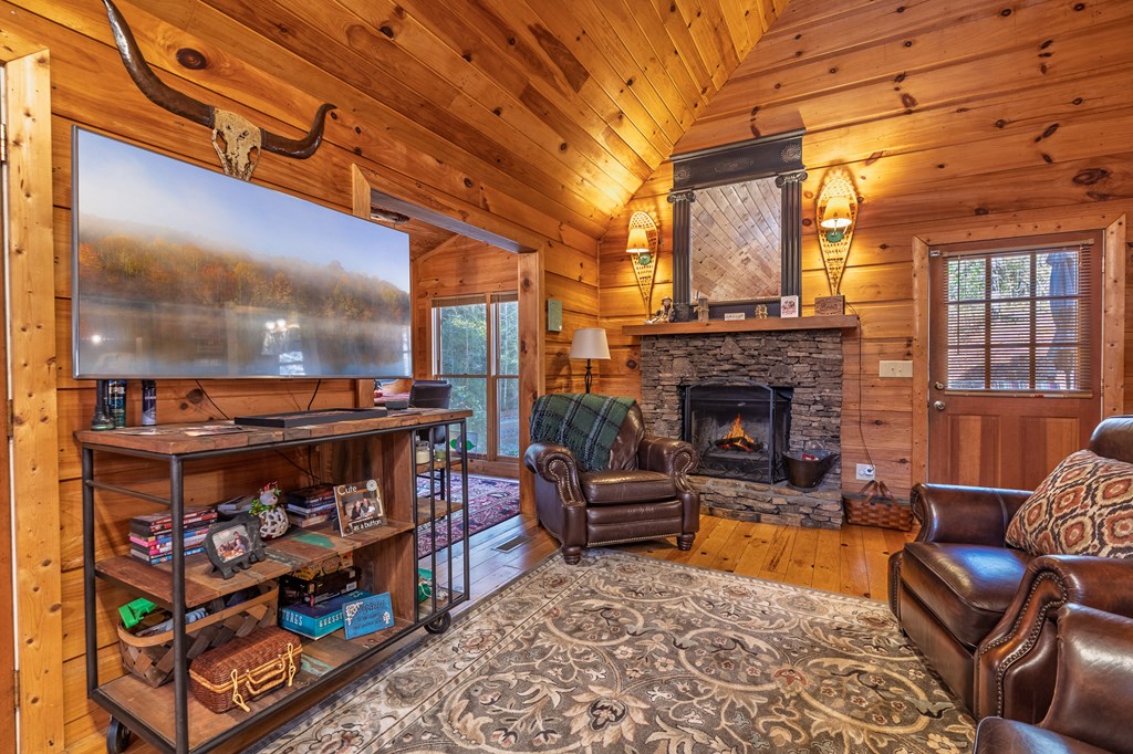 659 Kells Ridge Drive Ellijay, GA 30540 - Photo 16 of 41 a outdoor living space with patio furniture and a fireplace