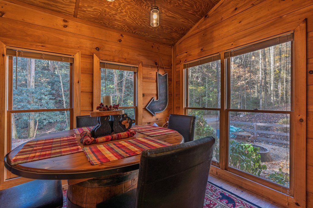 659 Kells Ridge Drive Ellijay, GA 30540 - Photo 18 of 41 a room with furniture and wooden floor