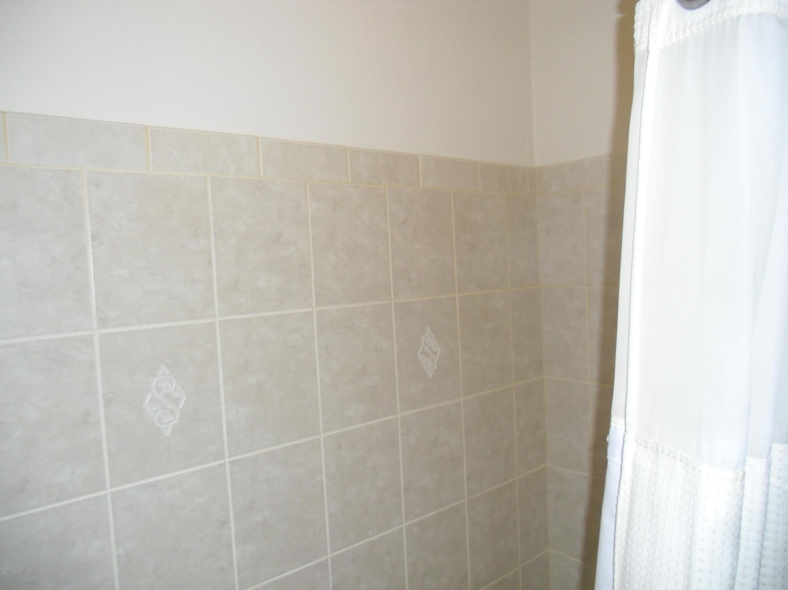 942 Via Puebla Rio Rico, AZ 85648 - Photo 8 of 73 a bathroom with a shower