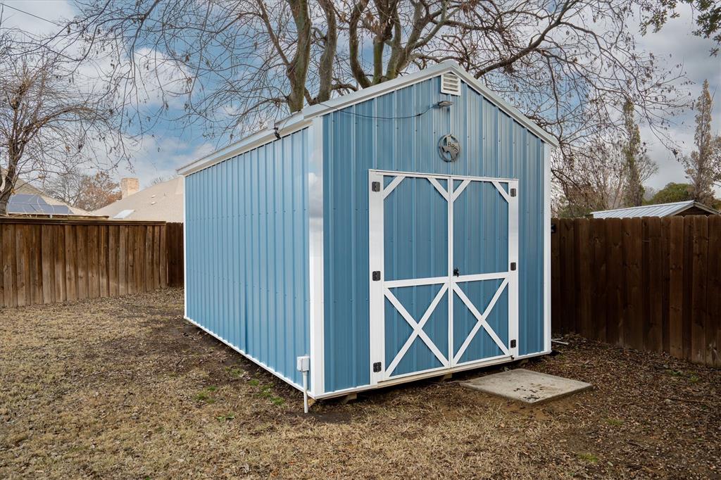 2113 Garner Court Rowlett, TX 75088 - Photo 28 of 40 a wooden door in front of a house