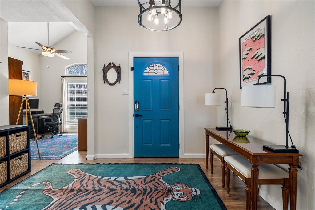 2113 Garner Court Rowlett, TX 75088 - Photo 6 of 40 a view of hall way with furniture and wooden floor