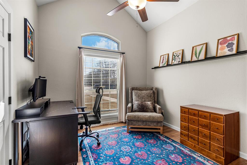 2113 Garner Court Rowlett, TX 75088 - Photo 9 of 40 a living room with furniture and a flat screen tv