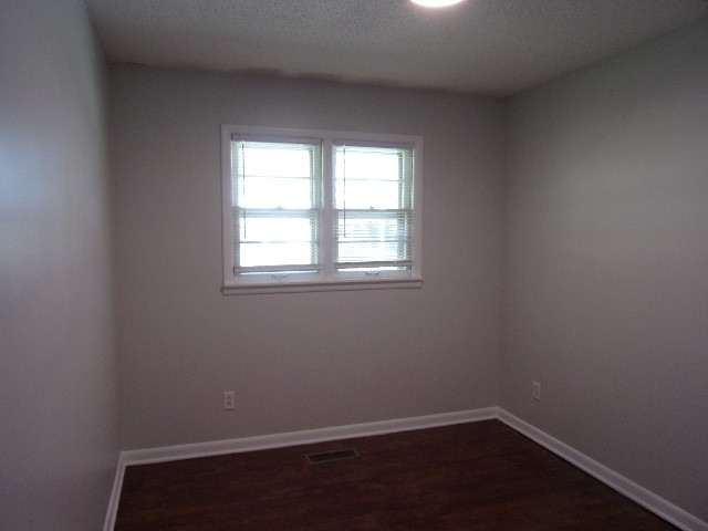 3231 State Line Road Taft, TN 38488 - Photo 11 of 26 an empty room with a window