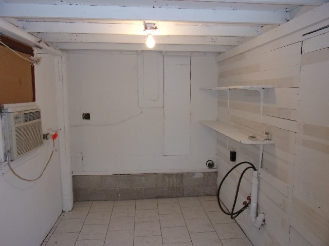 3231 State Line Road Taft, TN 38488 - Photo 19 of 26 a bathroom with a shower and a window