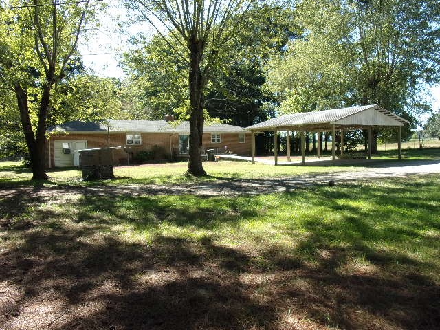 3231 State Line Road Taft, TN 38488 - Photo 22 of 26 a view of a house with a yard