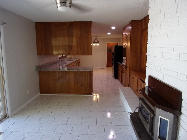 3231 State Line Road Taft, TN 38488 - Photo 7 of 26 a view of a kitchen with a sink