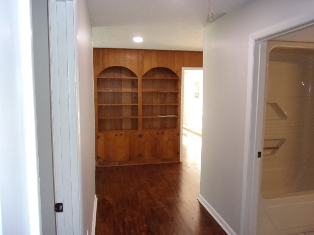 3231 State Line Road Taft, TN 38488 - Photo 9 of 26 a room with wooden floor and a cabinet