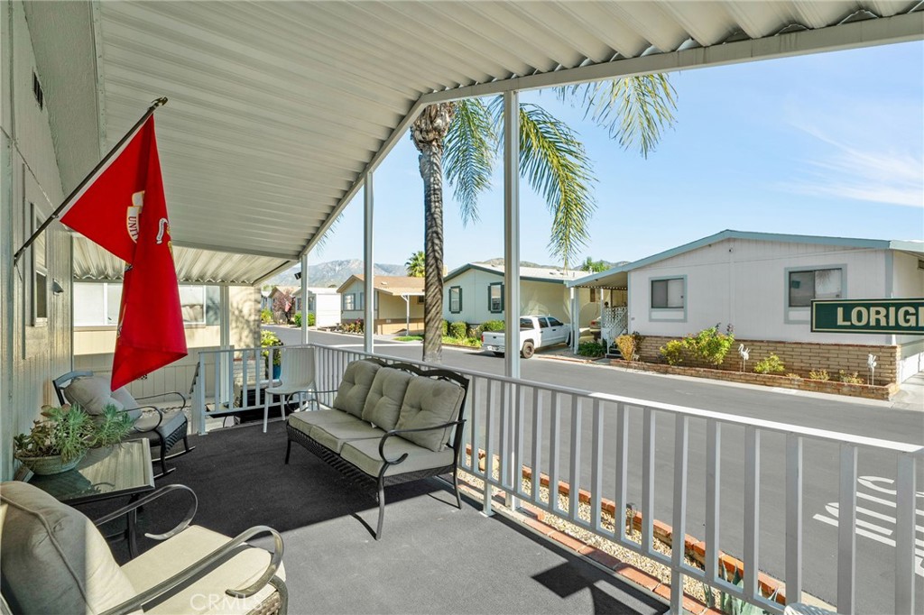 2140 Mentone, Unit 153 Mentone, CA 92359 - Photo 4 of 42 a view of porch with seating space