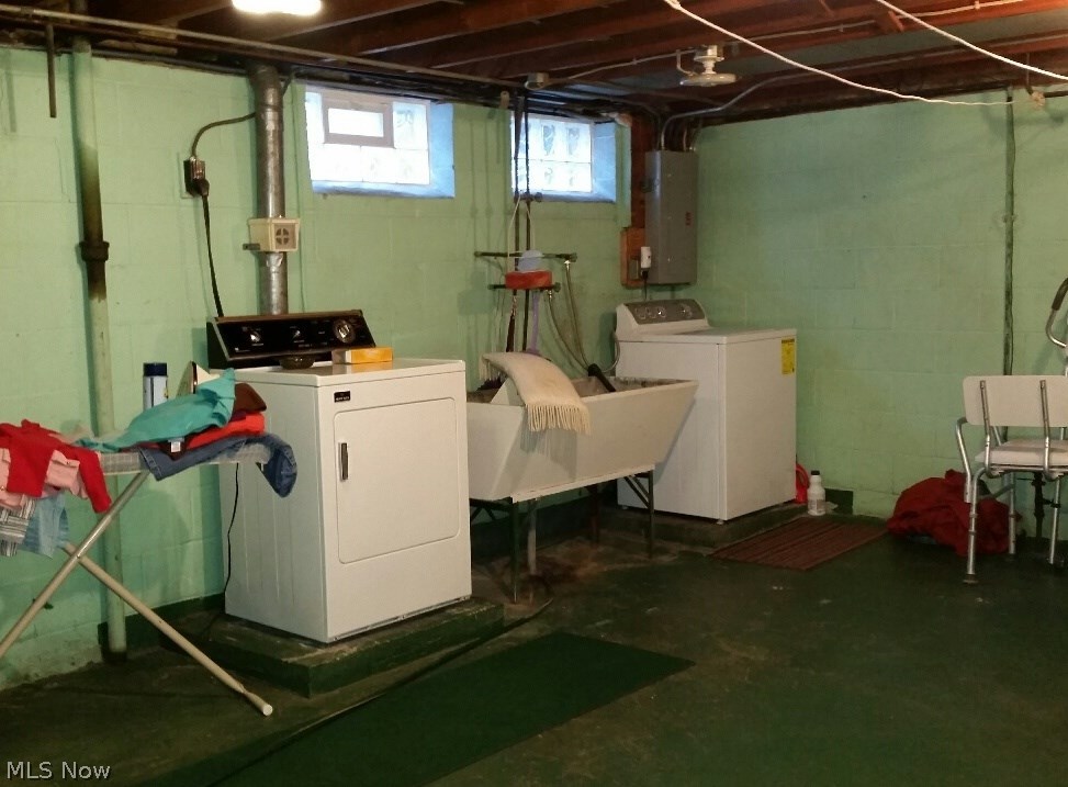 13271 McCracken Road Cleveland, OH 44125 - Photo 23 of 24 there's plenty of room for your laundry and for storage in this large basement.