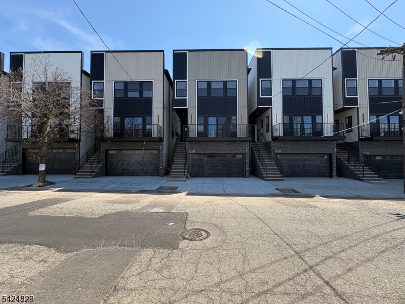 262 Hunterdon Street, Unit 1 Newark, NJ 07103 - Photo 29 of 31 a building outdoor space with patio furniture and potted plants