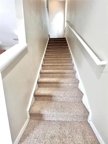a bathroom with a toilet a sink and bathtub