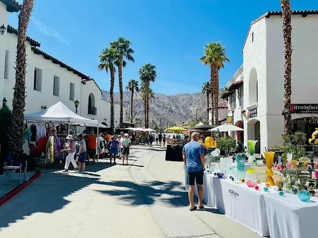 a view of street with shops