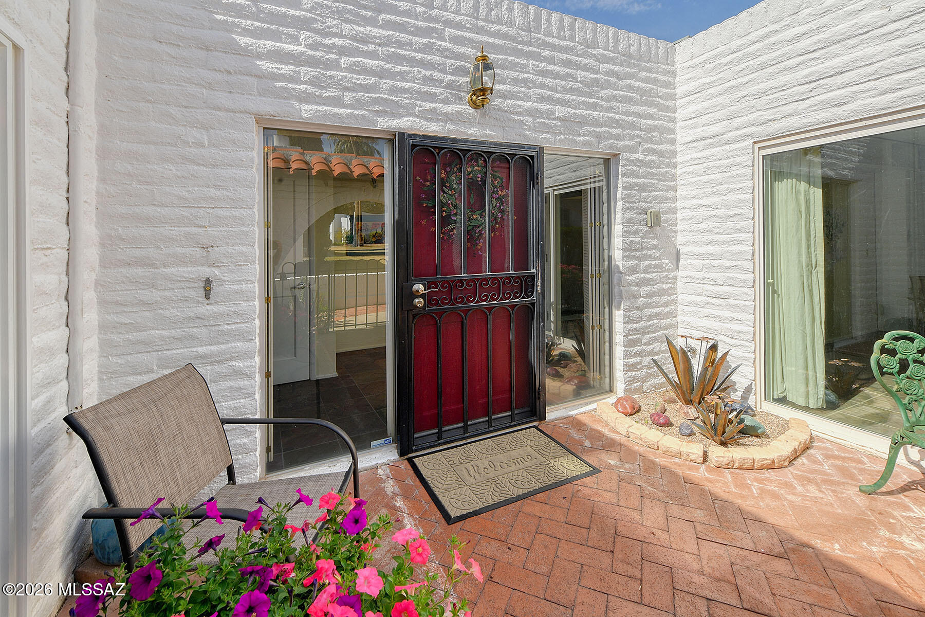 719 West Las Lomitas Road Tucson, AZ 85704 - Photo 8 of 44 a front view of a house with seating space