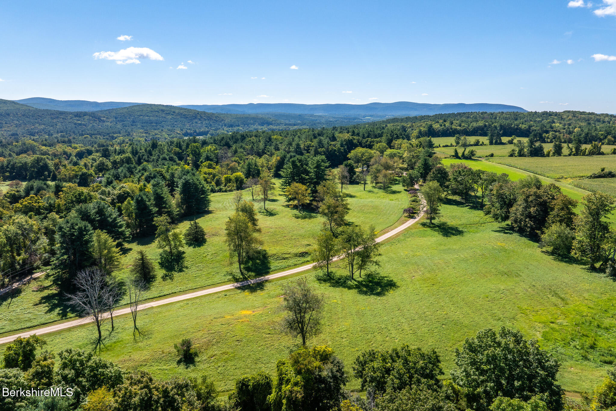 415 Brewer Branch Road New Marlborough, MA 01259 - Photo 1 of 65 a view of lake with houses