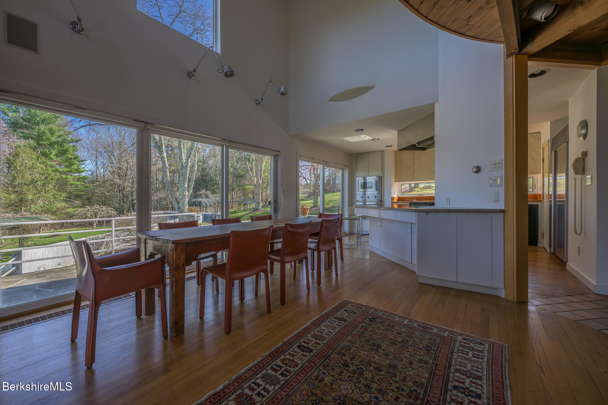 415 Brewer Branch Road New Marlborough, MA 01259 - Photo 19 of 65 a view of a dining room with furniture window and wooden floor