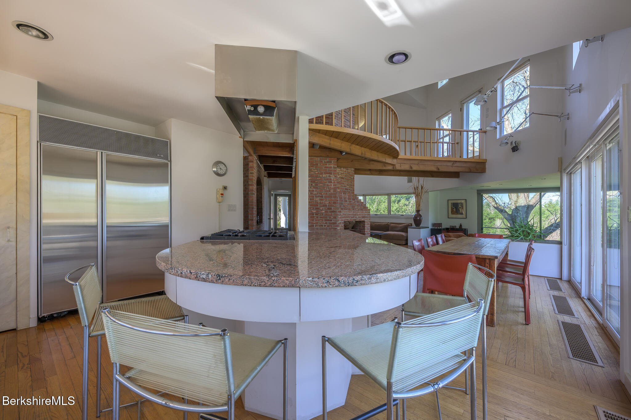415 Brewer Branch Road New Marlborough, MA 01259 - Photo 22 of 65 a view of dining room kitchen with furniture and wooden floor