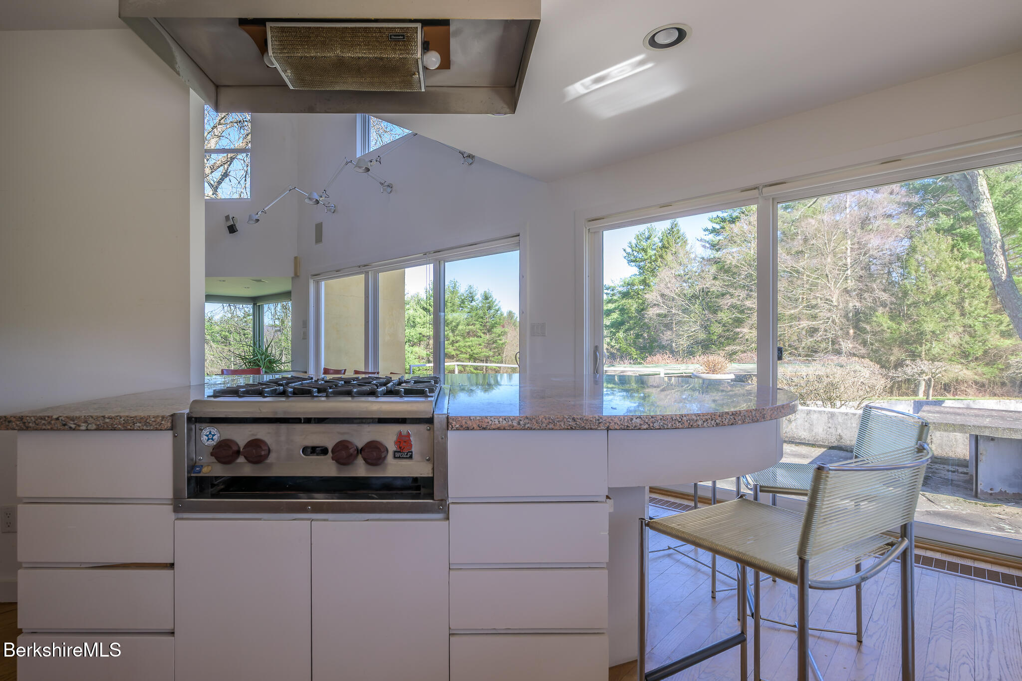 415 Brewer Branch Road New Marlborough, MA 01259 - Photo 24 of 65 a kitchen with a stove and a large window