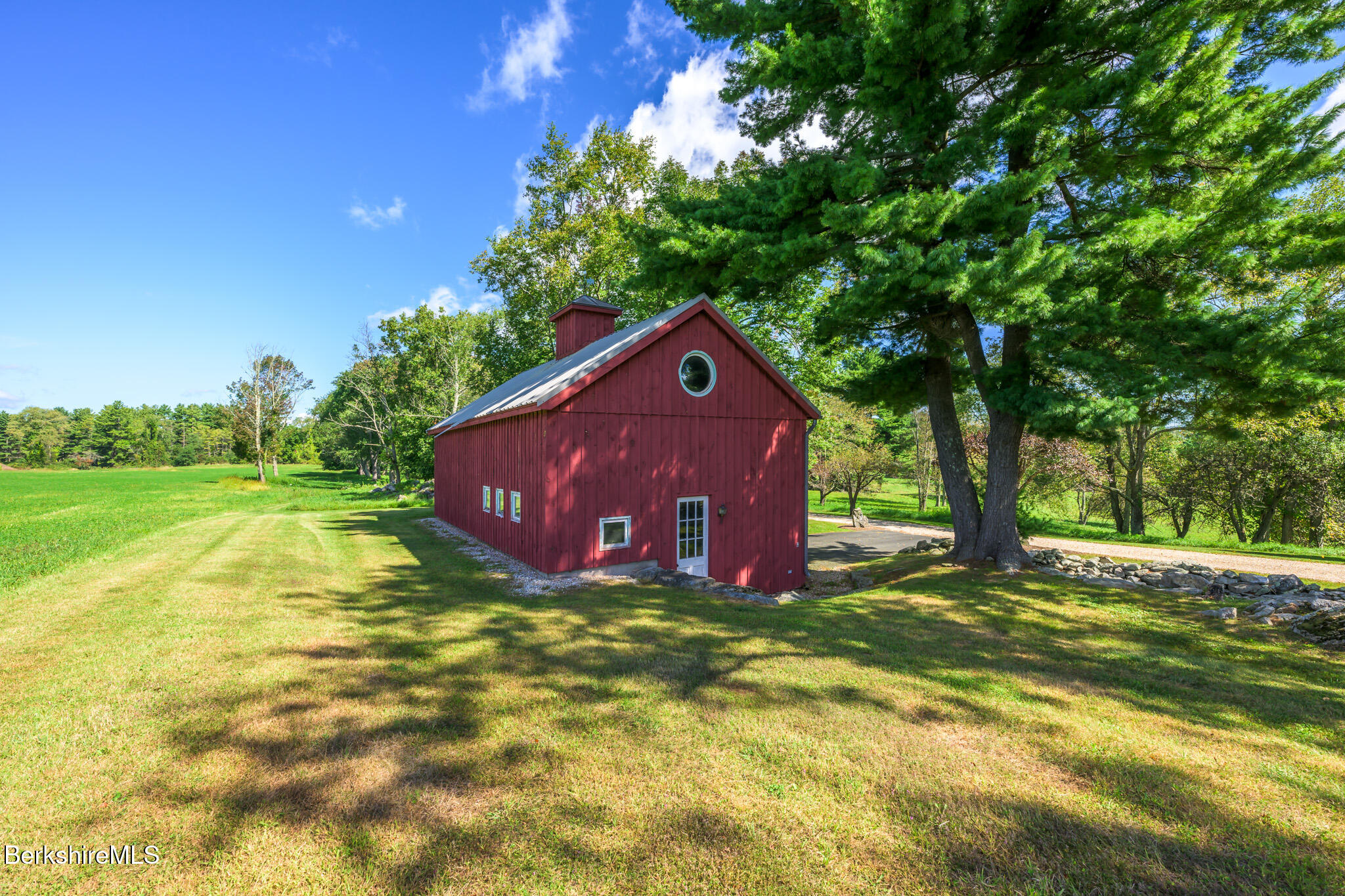 415 Brewer Branch Road New Marlborough, MA 01259 - Photo 59 of 65 a house view with a big yard and large trees