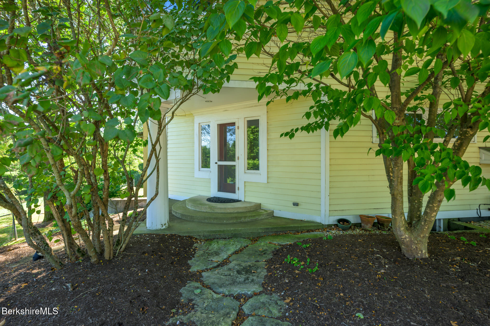 415 Brewer Branch Road New Marlborough, MA 01259 - Photo 6 of 65 a front view of a house with a garden