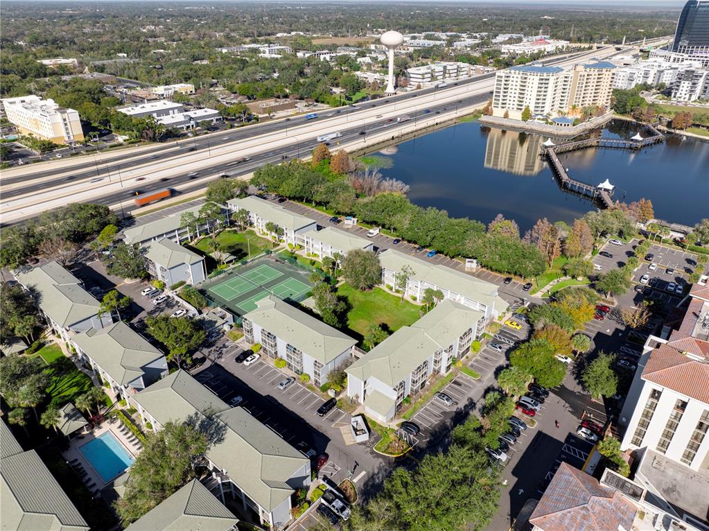 129 Blue Pointe Way, Unit 340 Altamonte Springs, FL 32701 - Photo 18 of 25 an aerial view of a residential building with swimming pool and ocean view