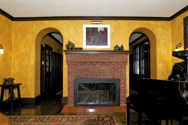 16 Beach Road Gloucester, MA 01930 - Photo 7 of 30 a living room with a fireplace and a rug