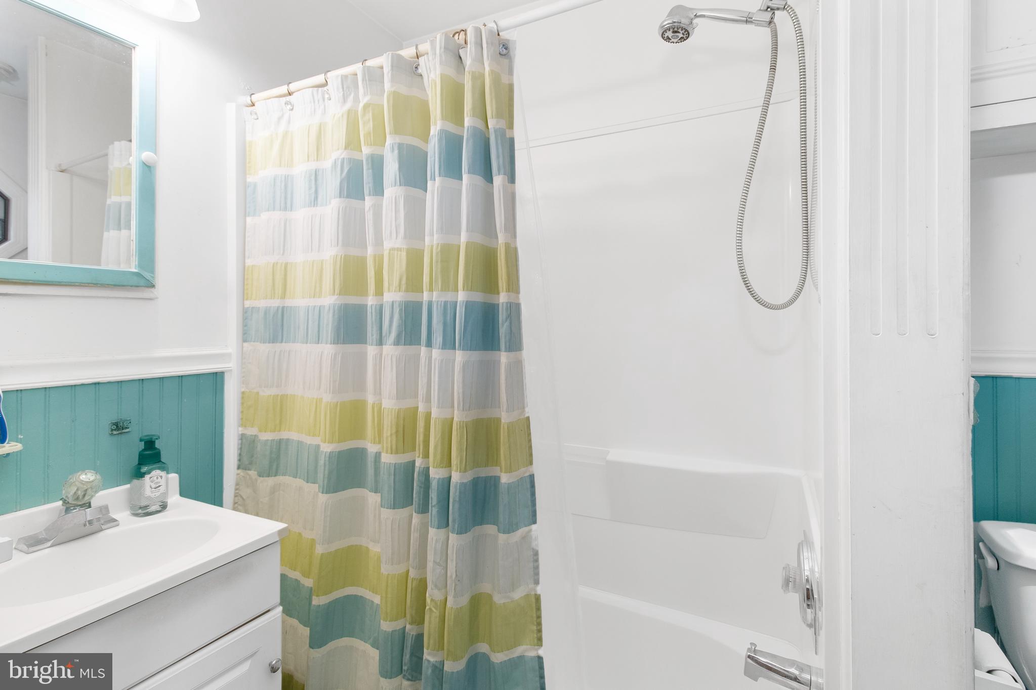 85 Madison Avenue Mount Holly, NJ 08060 - Photo 12 of 41 a bathroom with a sink and a shower