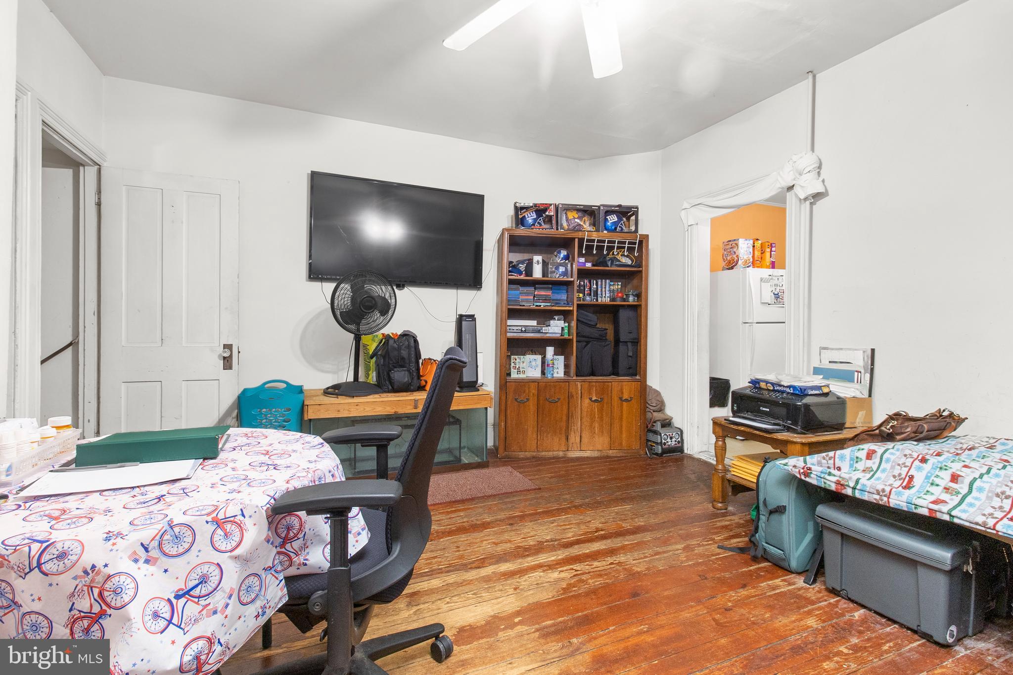85 Madison Avenue Mount Holly, NJ 08060 - Photo 15 of 41 a bedroom with a bed and a bookshelf