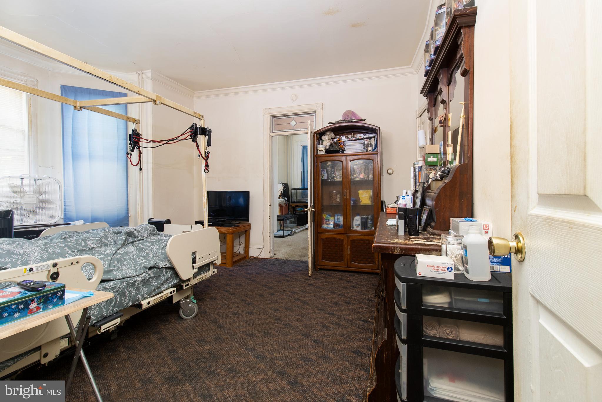 85 Madison Avenue Mount Holly, NJ 08060 - Photo 17 of 41 a bedroom with furniture and a window