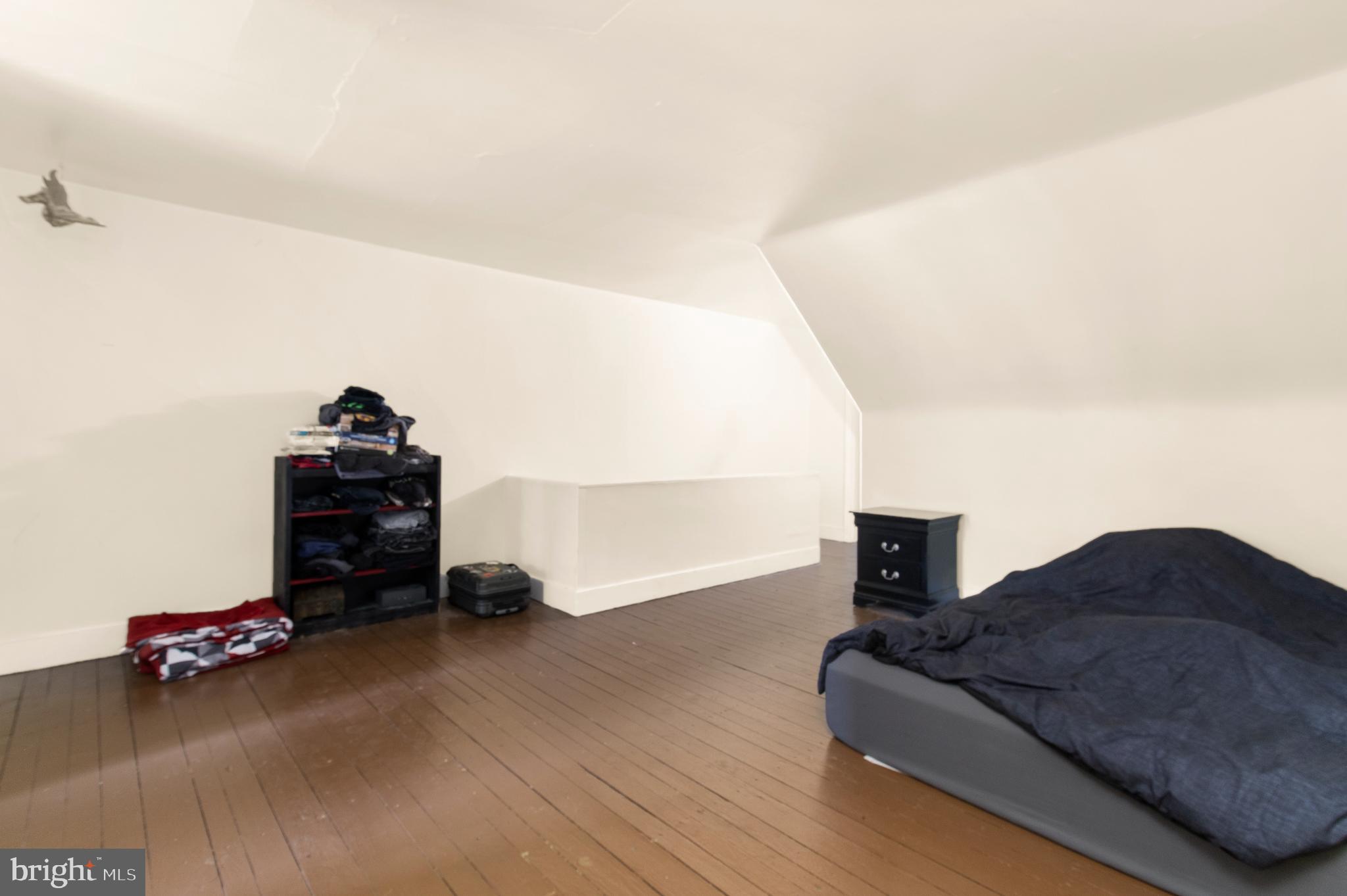 85 Madison Avenue Mount Holly, NJ 08060 - Photo 22 of 41 a living room with furniture and a lamp