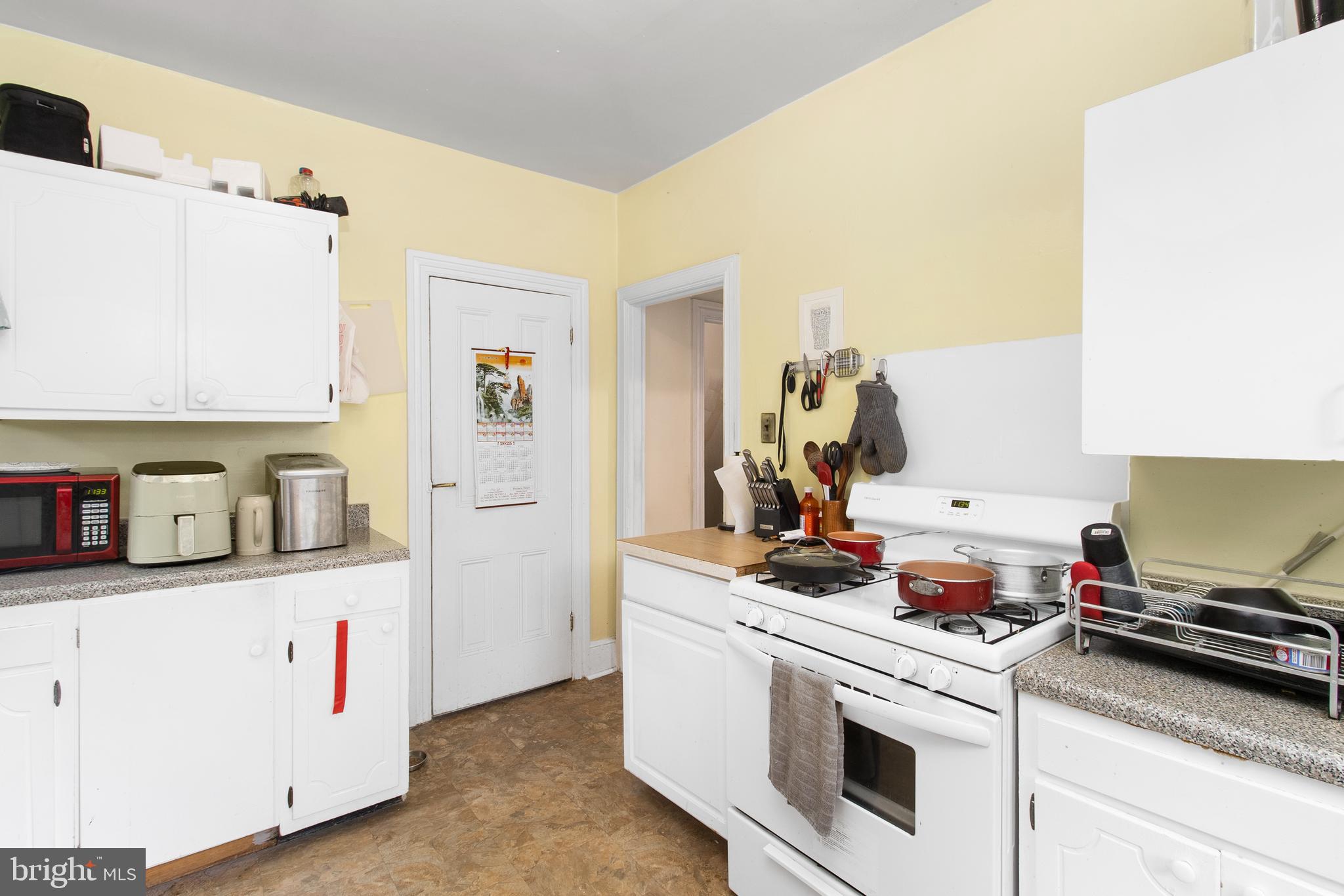 85 Madison Avenue Mount Holly, NJ 08060 - Photo 29 of 41 a kitchen with a stove and cabinets